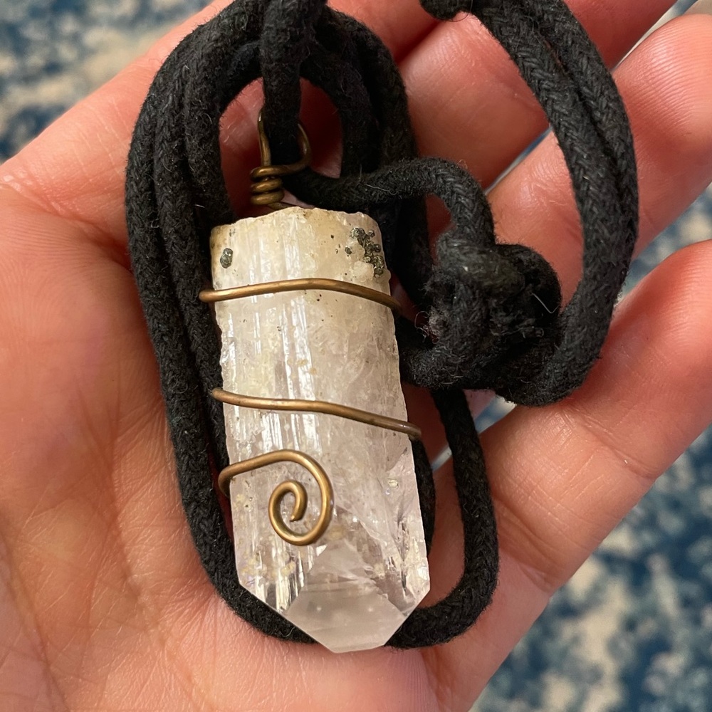 Danburite Crystal with Pyrite Inclusion in wire wrap on canvas cord